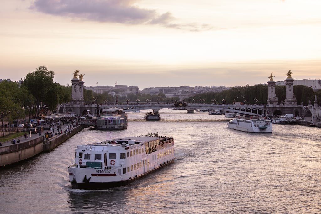 Ferries Sailing on Seine in Paris