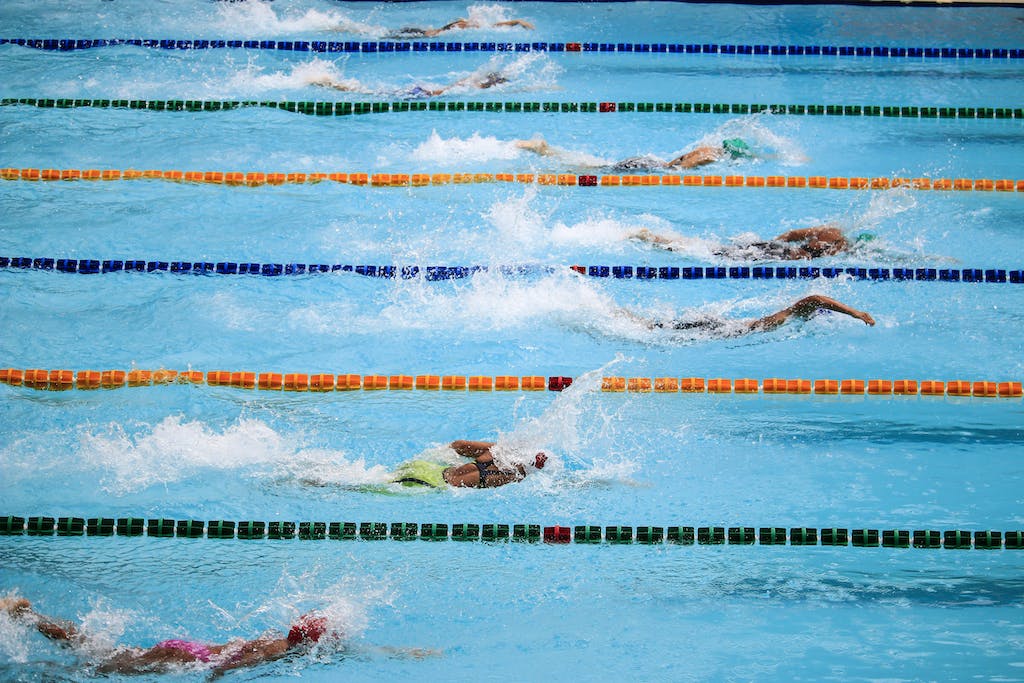 People Doing Swim Race